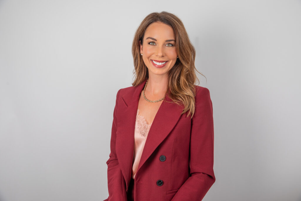 Professional woman smiling during studio session by the best headshot photographer in Houston