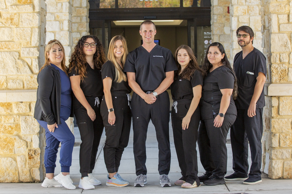 Team company headshots on-location in Houston, Professional Headshots Houston group portrait